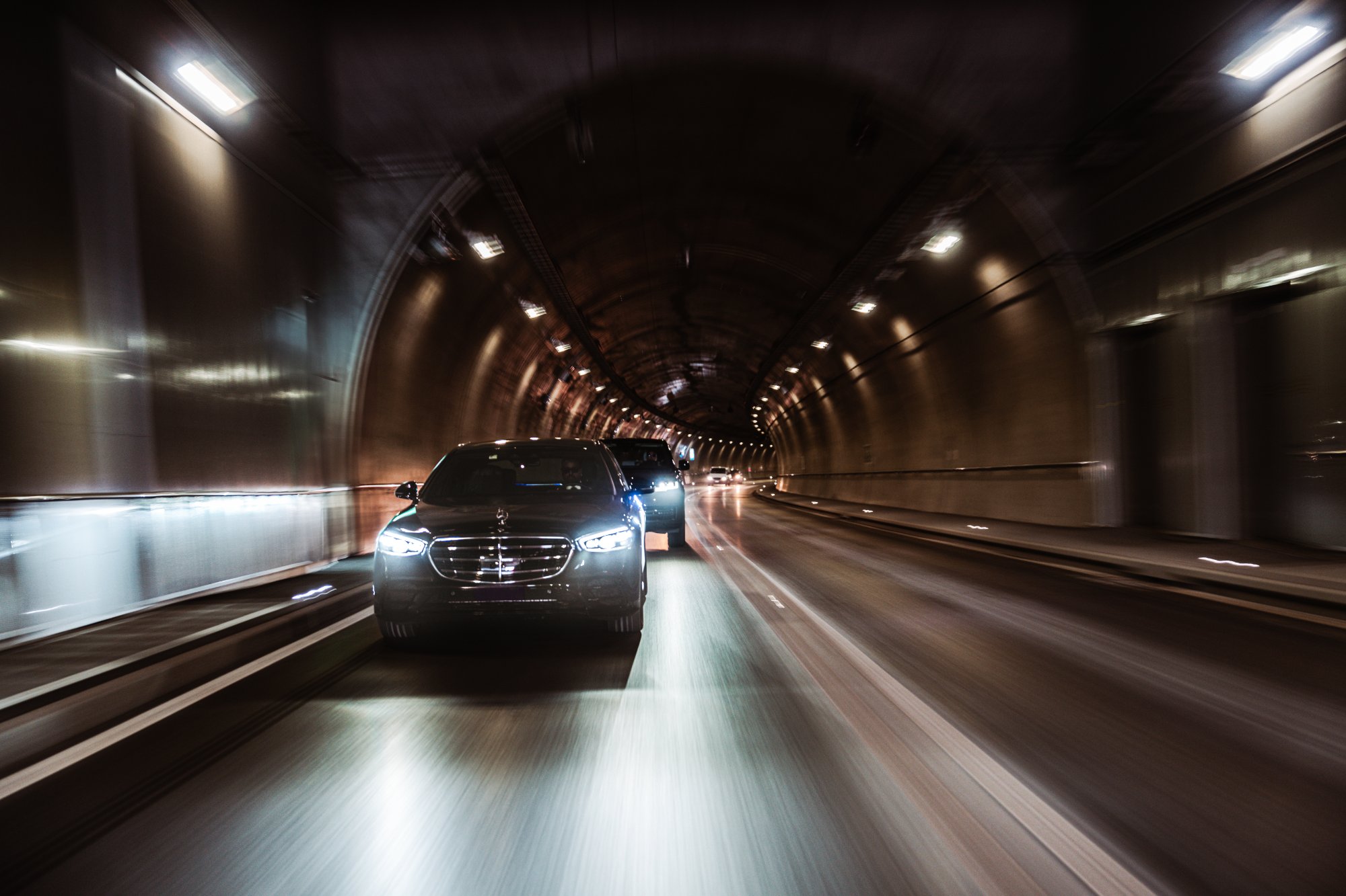 Ernest and Sons luxury chauffeur convoy tunnel